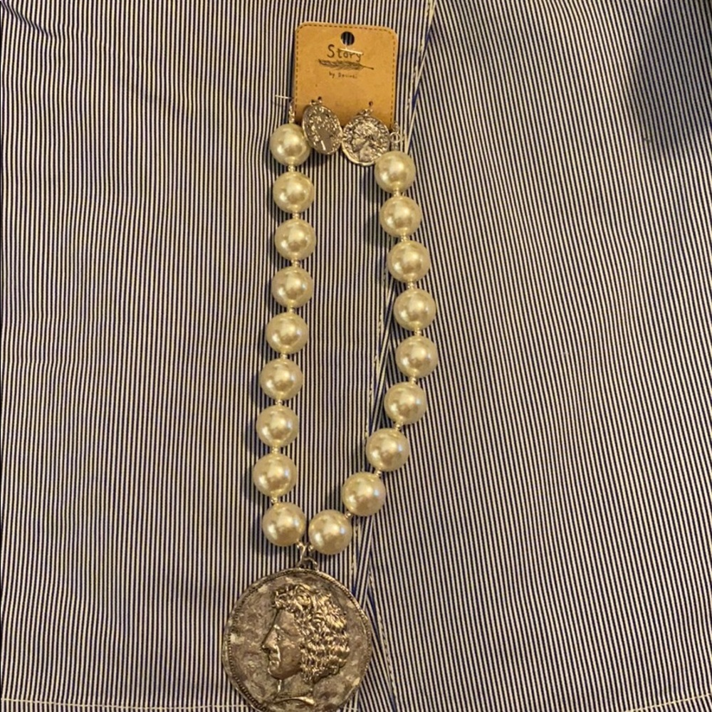 large pearl necklace and earrings